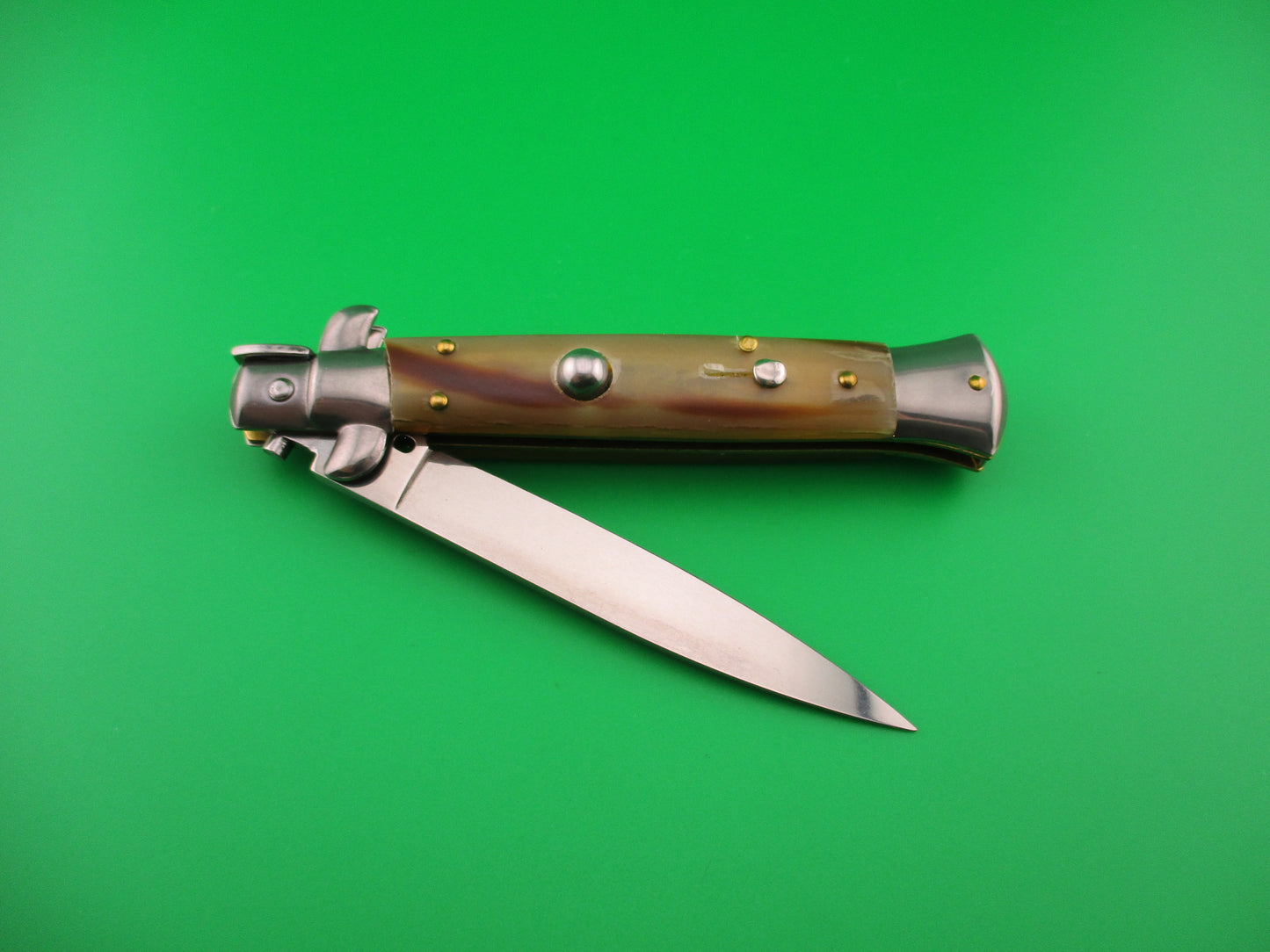 FRANK B 23cm Italian Stiletto Light Honey & Caramel horn swivel bolster automatic knife