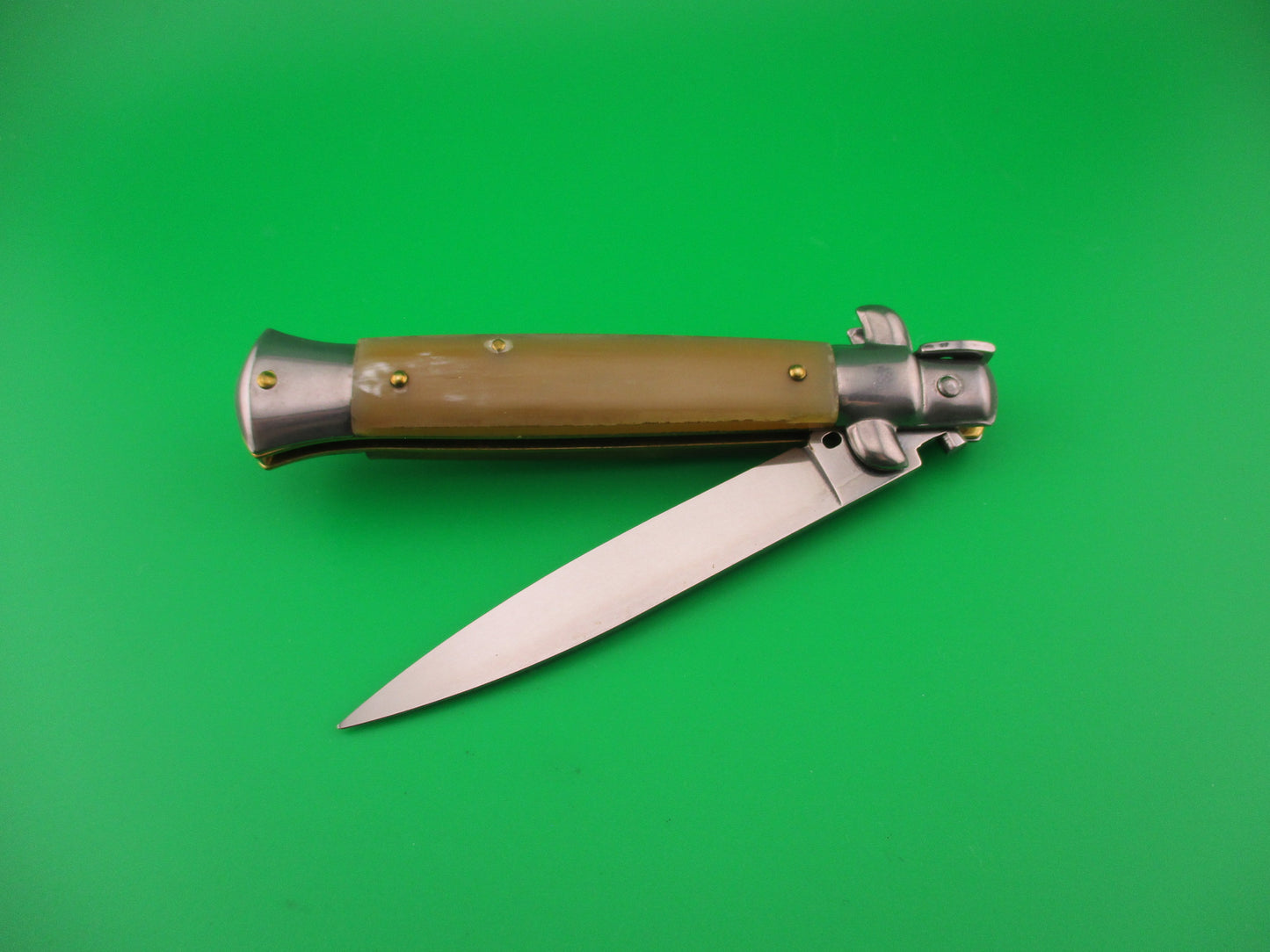 FRANK B 23cm Italian Stiletto Light Honey & Caramel horn swivel bolster automatic knife