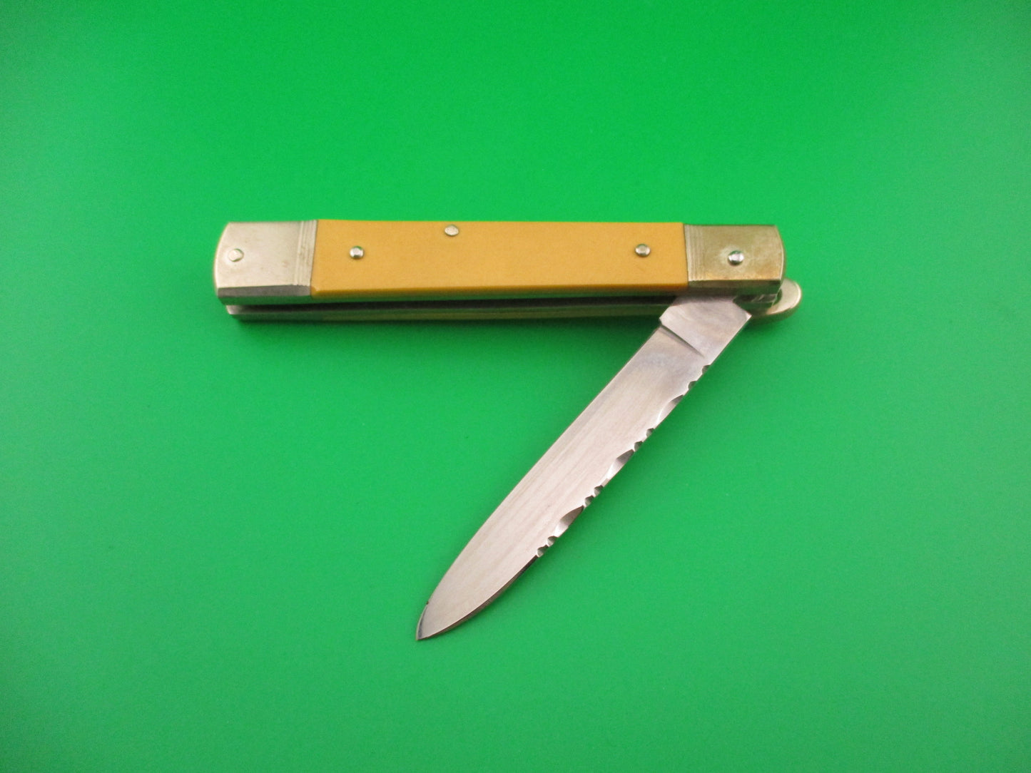 Hubertus SOLINGEN 11cm German Lever Slimline Yellow Micarta filework automatic knife