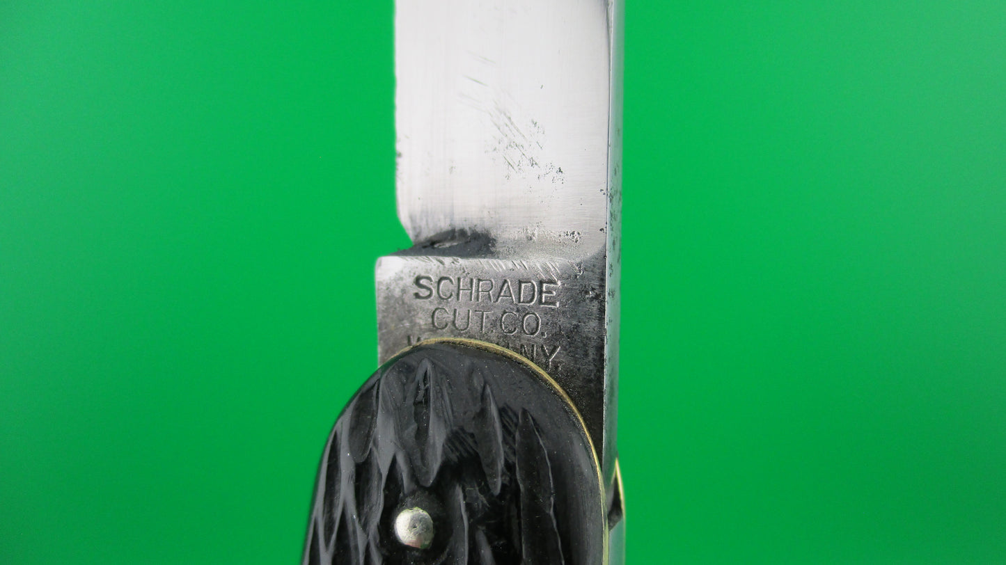 Schrade Cut Co Large Double 3 3/4 inch Black jigged switchblade knife