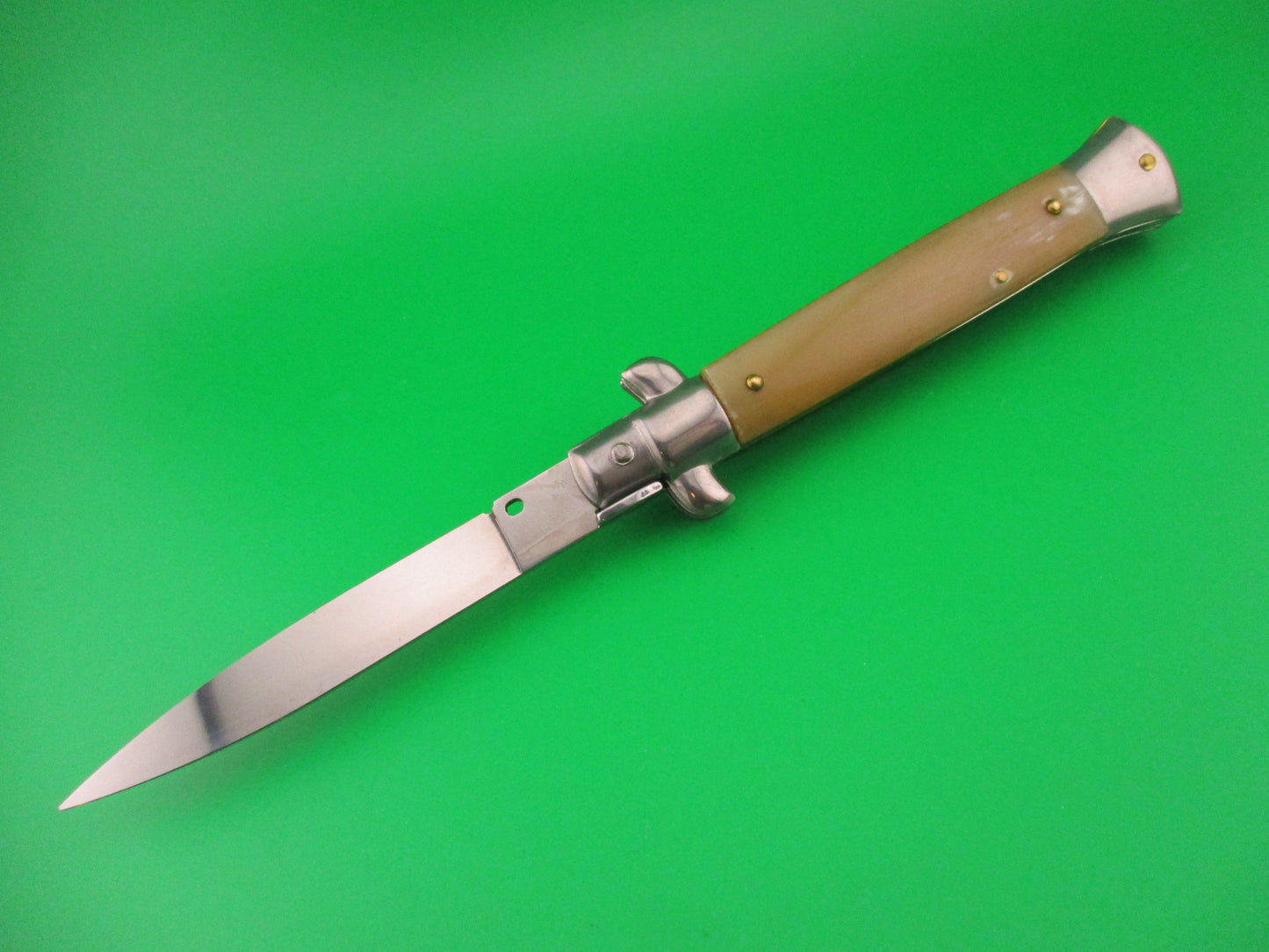 FRANK B 23cm Italian Stiletto Light Honey & Caramel horn swivel bolster automatic knife
