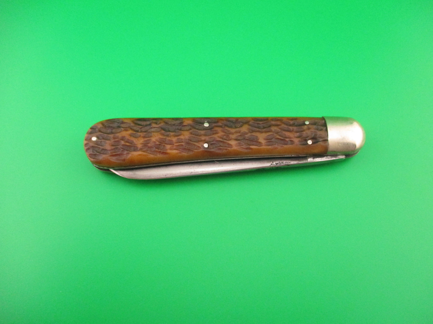 Press Button Knife Co Invincible Spear point blade picked bone switchblade knife