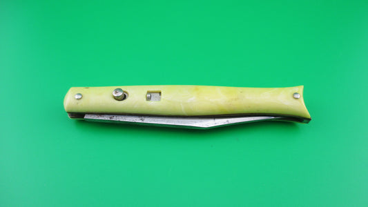 COLONIAL SHUR-SNAP Fishtail 1st Generation Yellow swirl switchblade knife