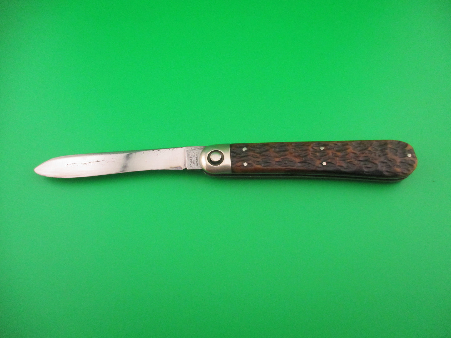 Press Button Knife Co Invincible Spear point blade picked bone switchblade knife