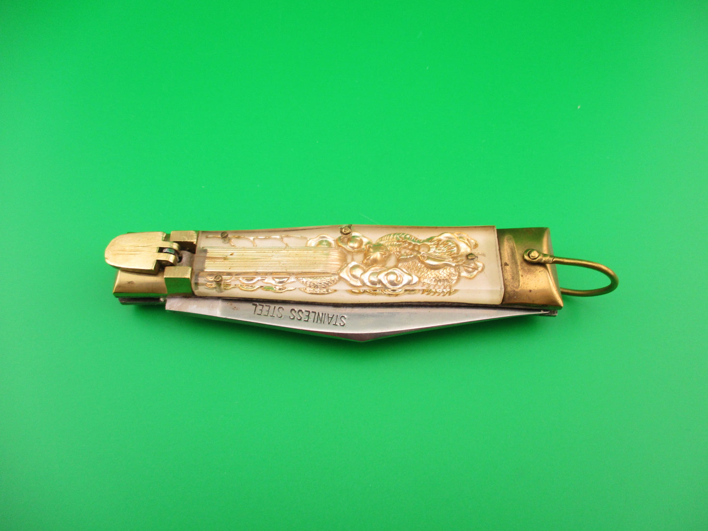 STAINLESS STEEL 19cm Bullfighter Dragon vintage White Lever switchblade knife