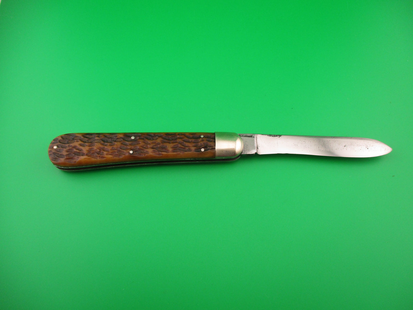 Press Button Knife Co Invincible Spear point blade picked bone switchblade knife