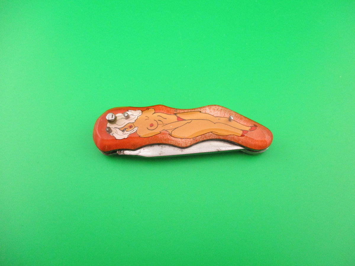 Russian Prison Knife Sexy Pinup Woman white hair topless pinup switchblade knife