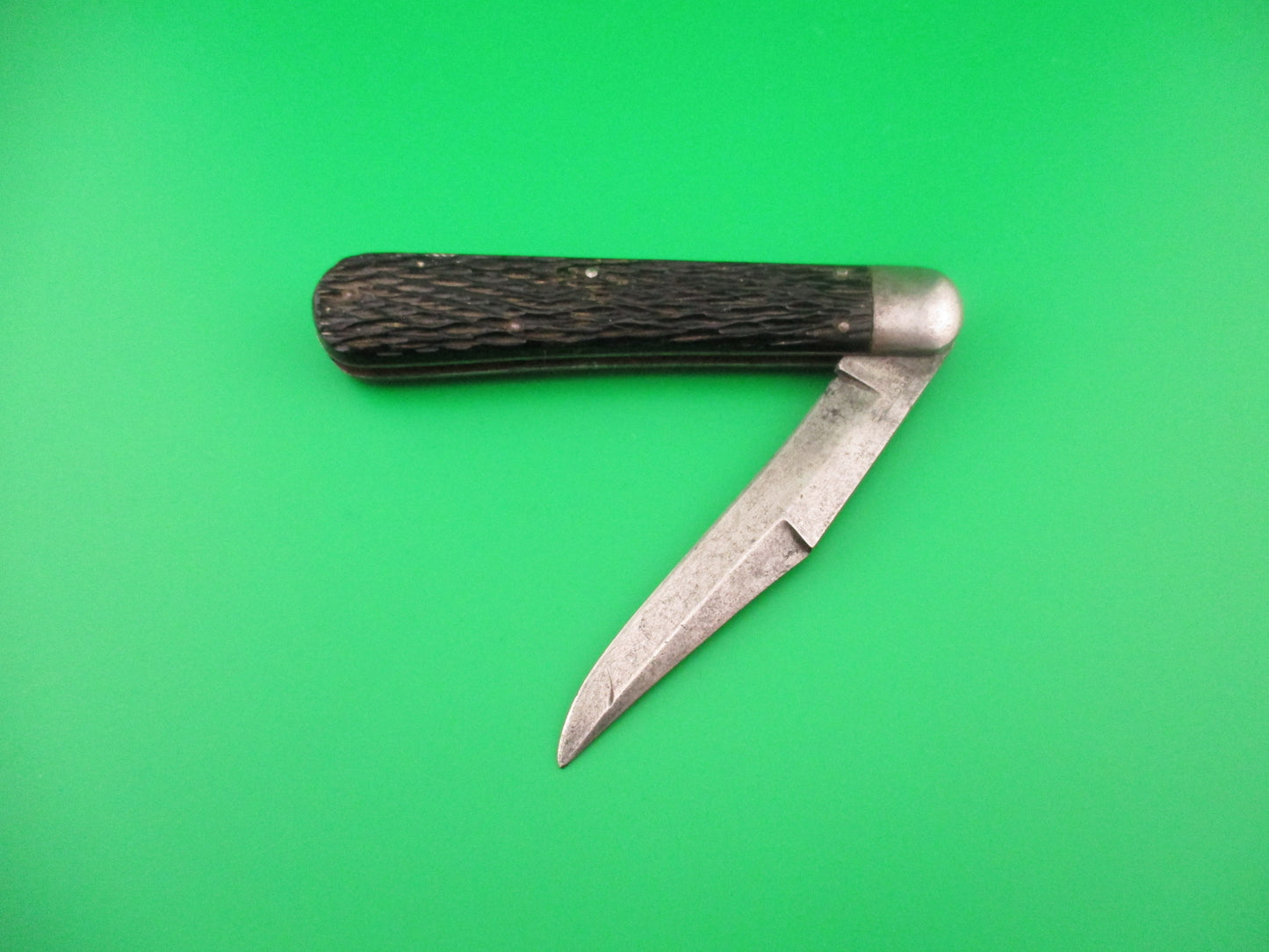 Schrade Cut Co 1614 3/4 Hunter Saber grind Black stagged automatic knife