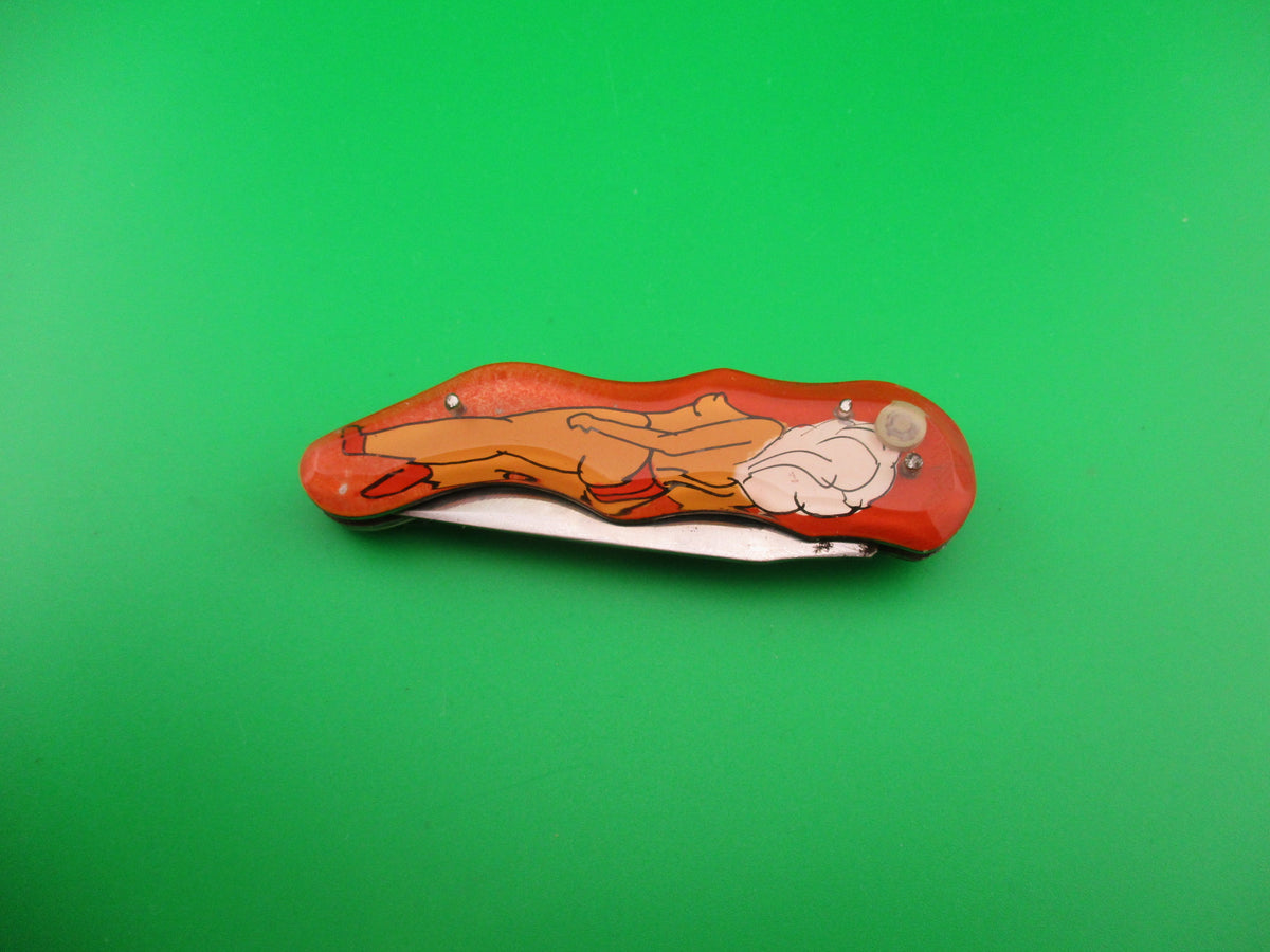 Russian Prison Knife Sexy Pinup Woman white hair topless pinup switchblade knife