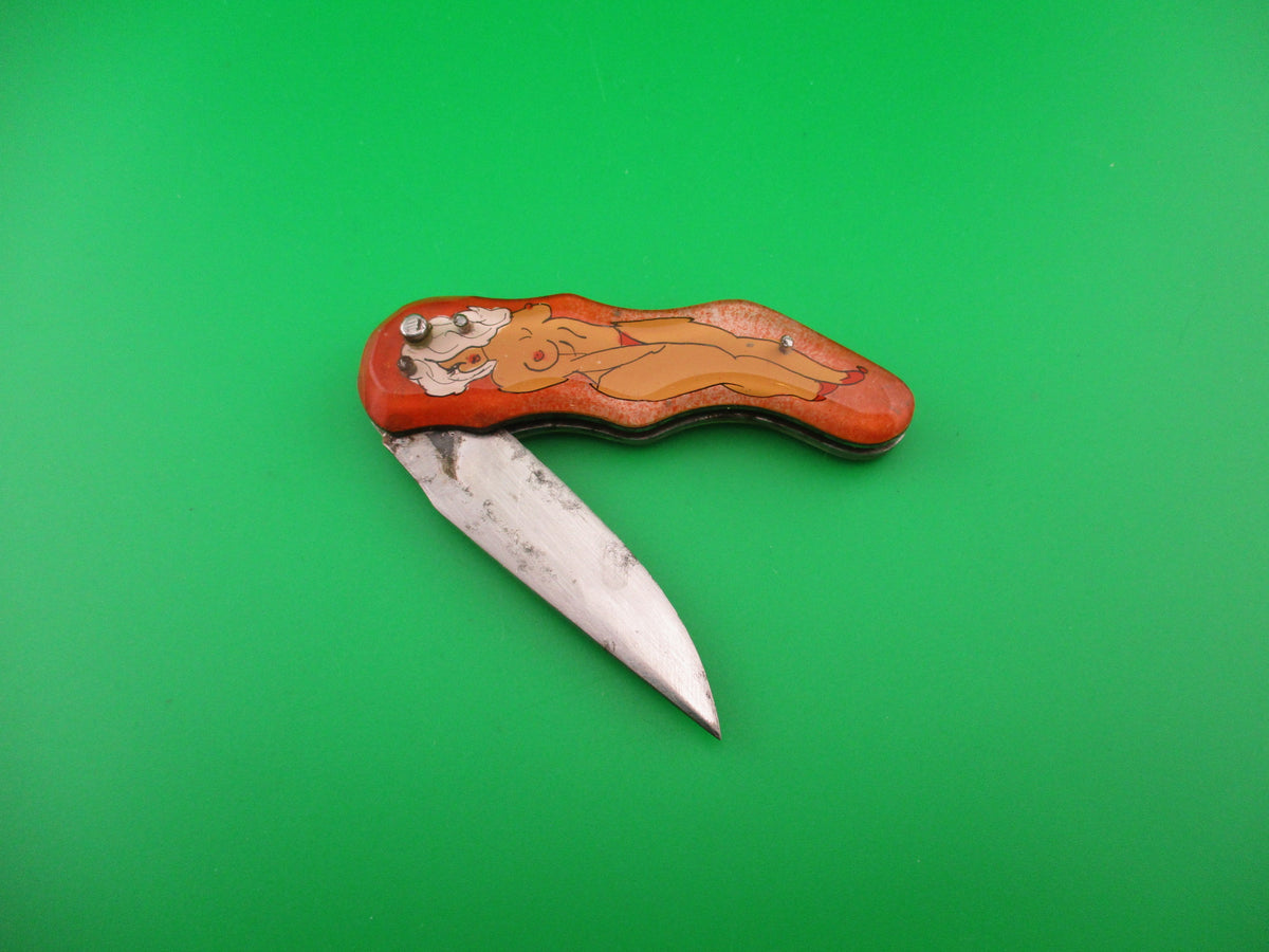 Russian Prison Knife Sexy Pinup Woman white hair topless pinup switchblade knife