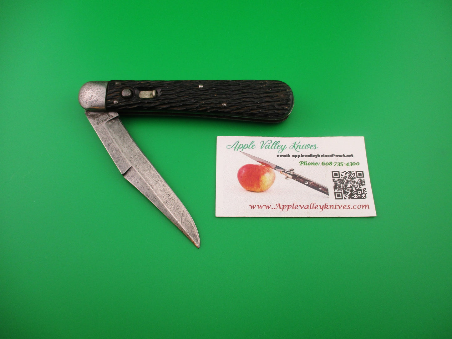 Schrade Cut Co 1614 3/4 Hunter Saber grind Black stagged automatic knife