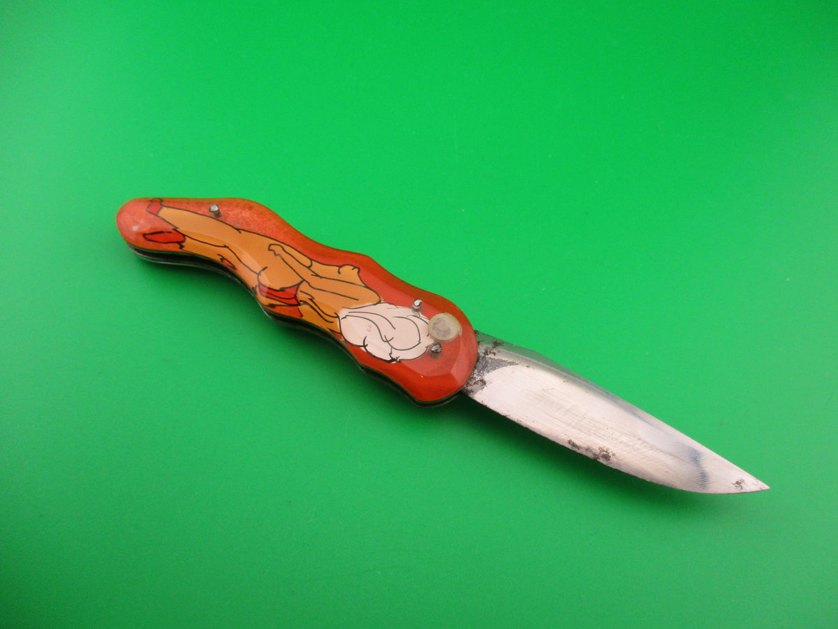 Russian Prison Knife Sexy Pinup Woman white hair topless pinup switchblade knife