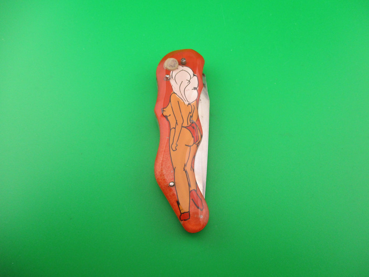 Russian Prison Knife Sexy Pinup Woman white hair topless pinup switchblade knife