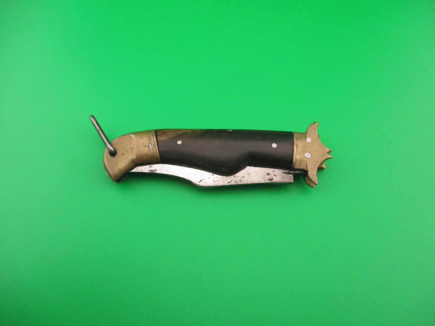 A 19cm Indian Vintage Lever Pagoda Guard Horn handled automatic knife