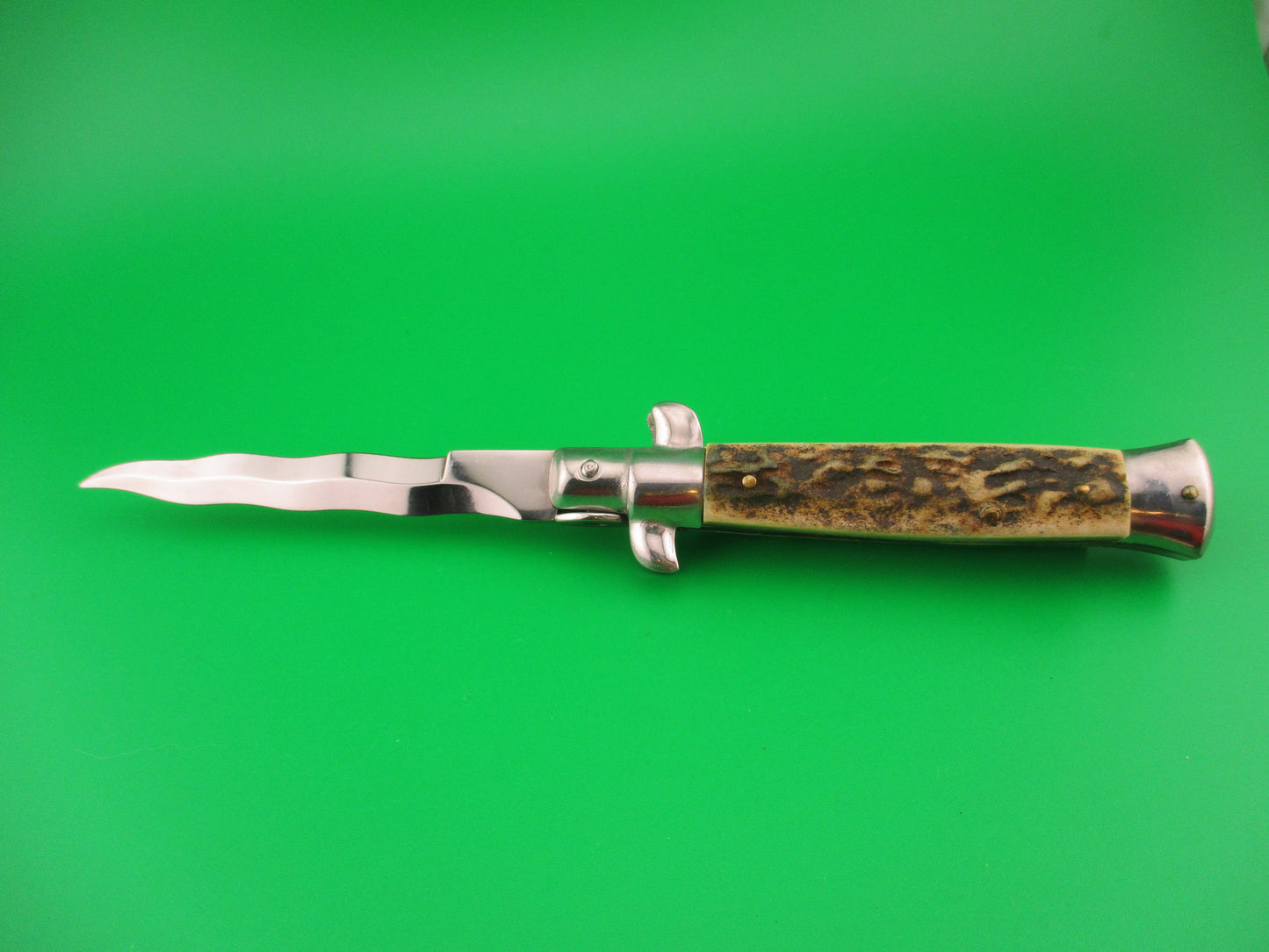 AKC MADE IN ITALY 18cm Italian Stag swivel bolster KRIS blade automatic knife