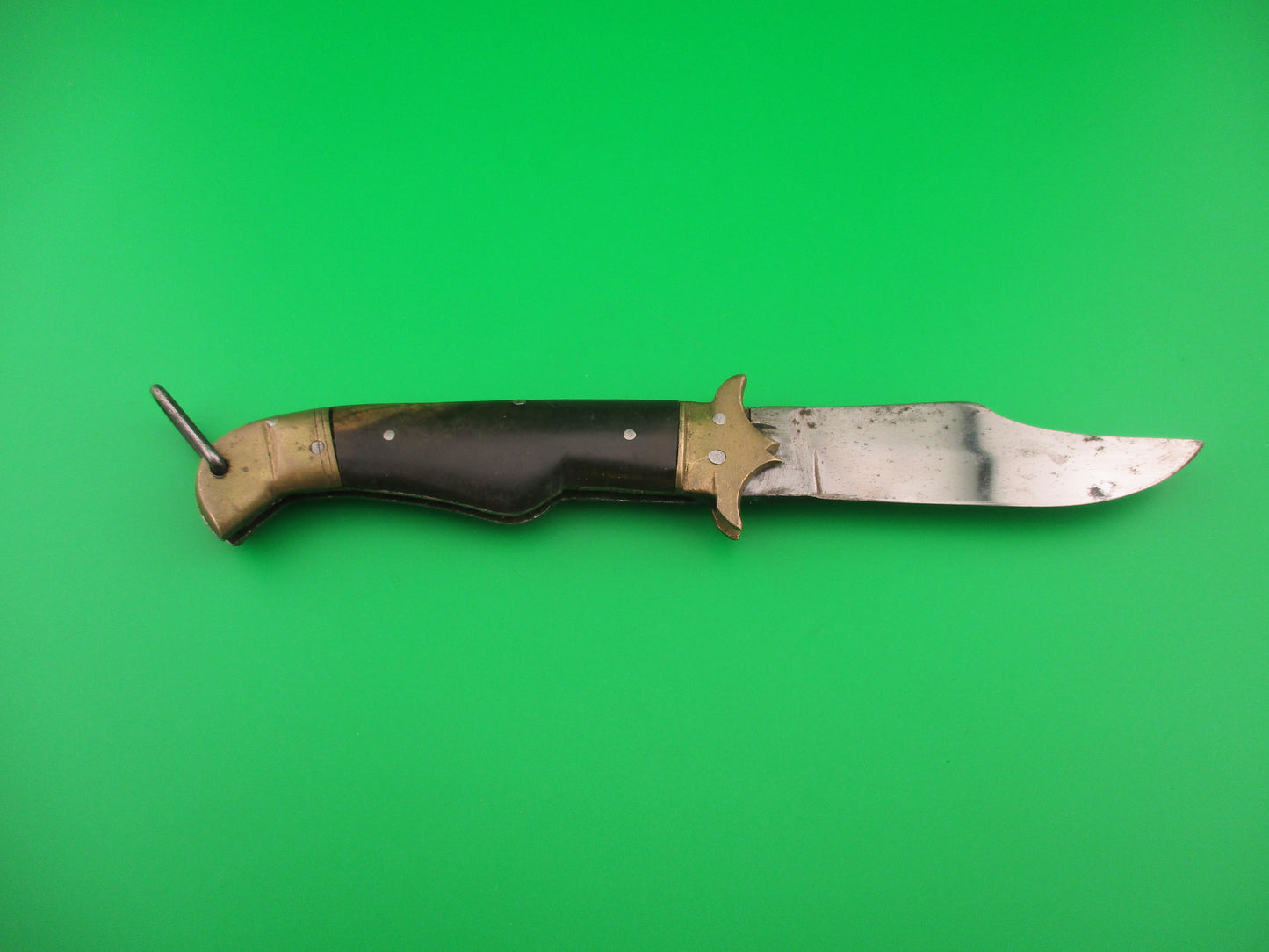 A 19cm Indian Vintage Lever Pagoda Guard Horn handled automatic knife