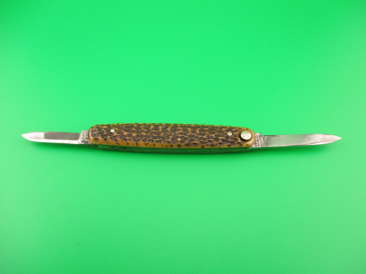 Press Button Knife Co Medium double bone switchblade knife model 100 w file blade