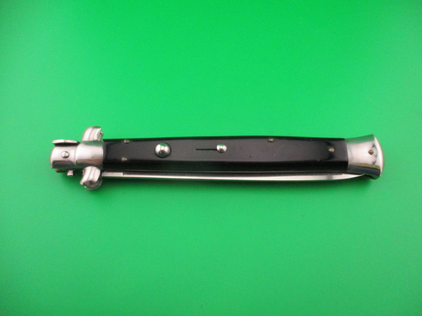 Sterile 33cm Italian Swivel bolster Flat grind automatic knife