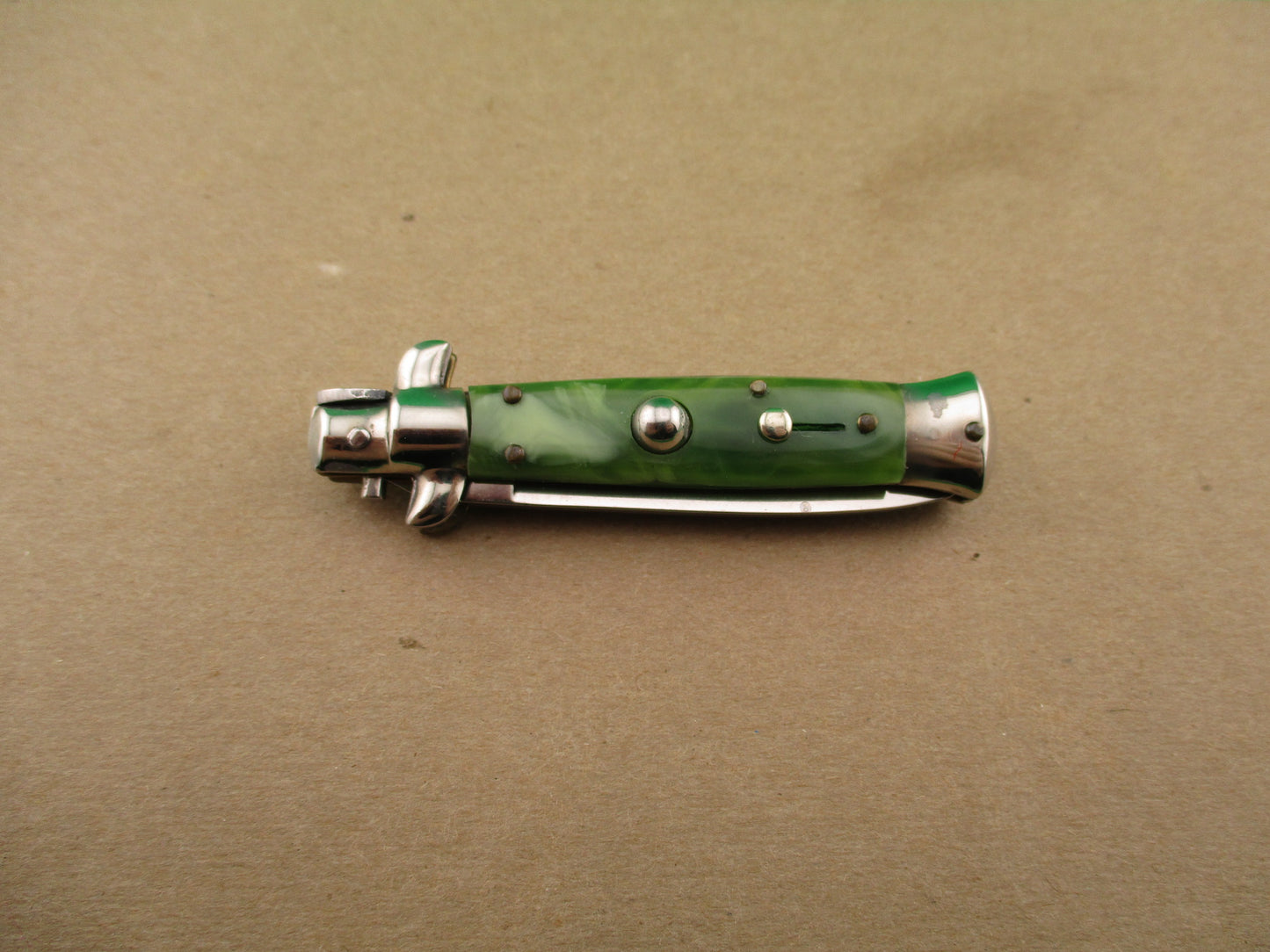 ROSTFREI 14cm Italian Swivel bolster D Stamped Green Swirl automatic knife