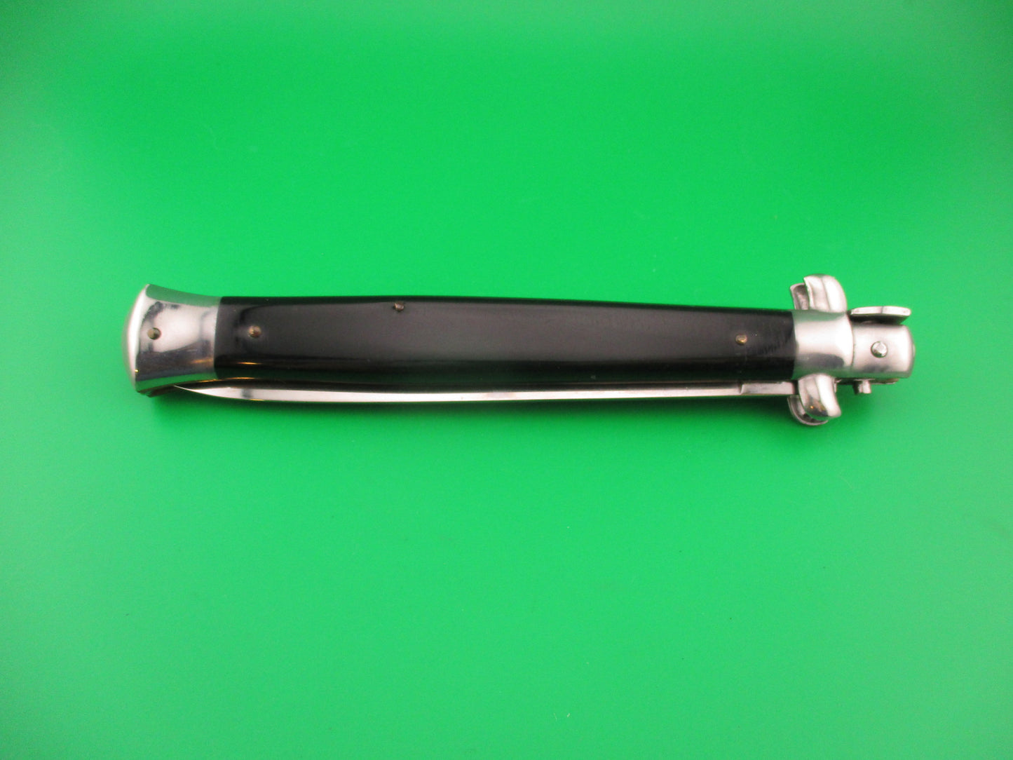 Sterile 33cm Italian Swivel bolster Flat grind automatic knife