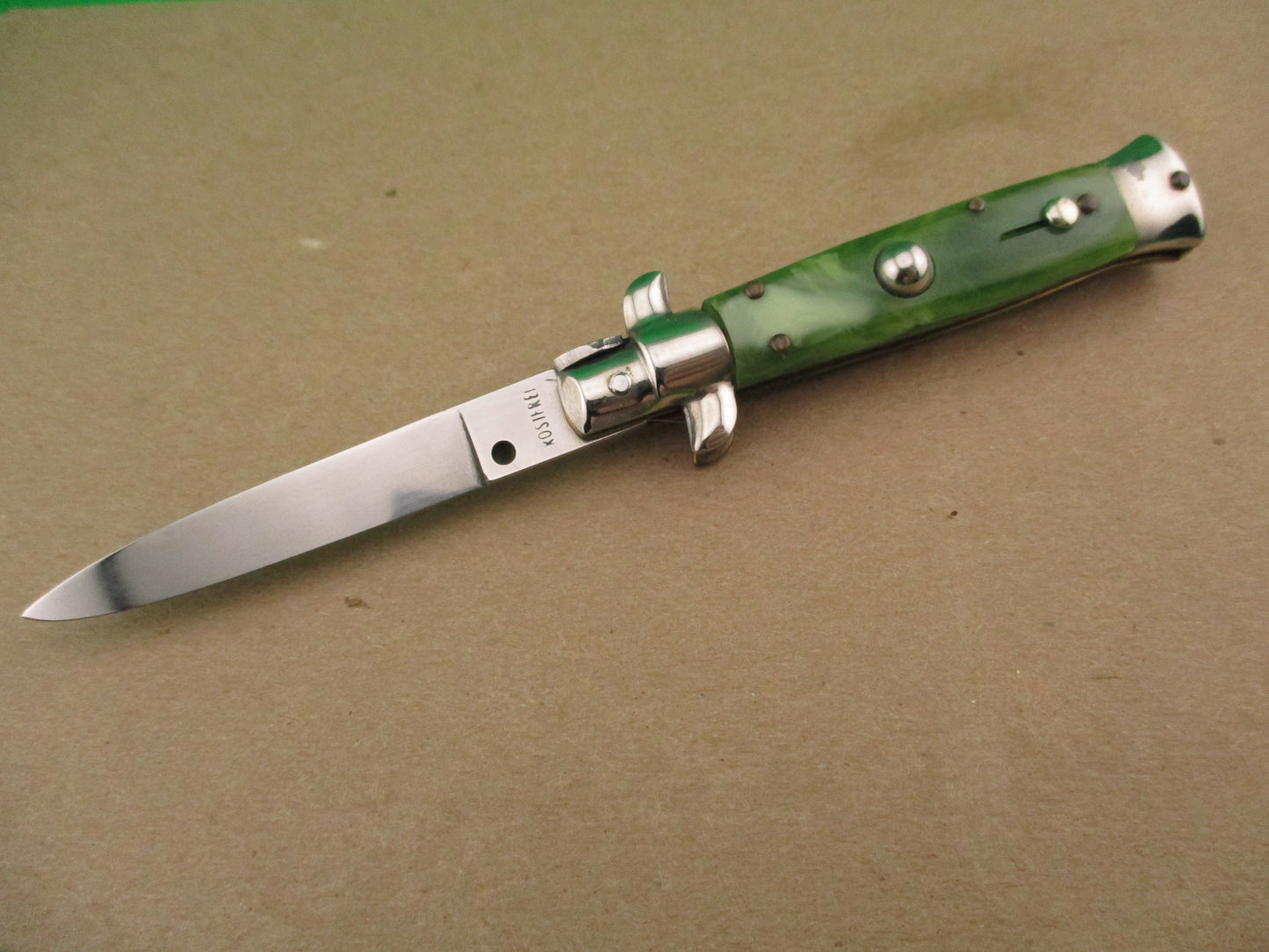 ROSTFREI 14cm Italian Swivel bolster D Stamped Green Swirl automatic knife