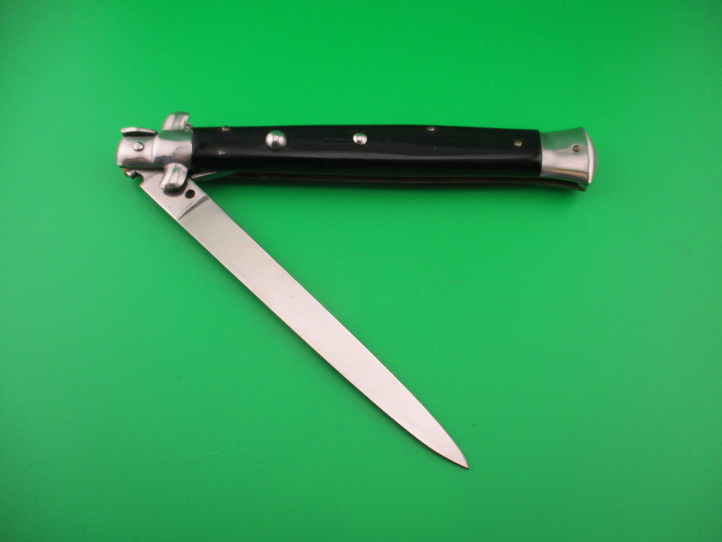 Sterile 33cm Italian Swivel bolster Flat grind automatic knife