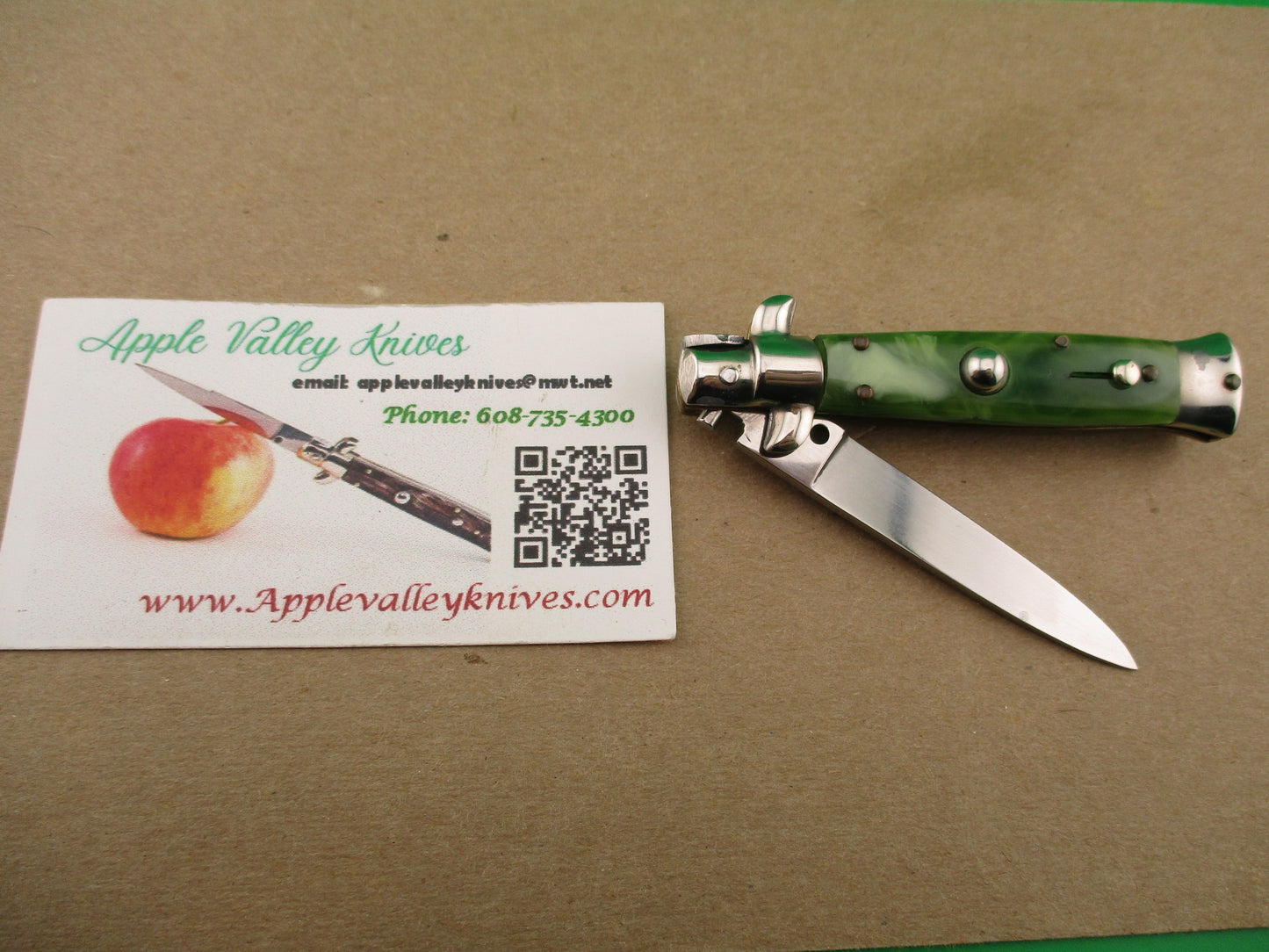 ROSTFREI 14cm Italian Swivel bolster D Stamped Green Swirl automatic knife