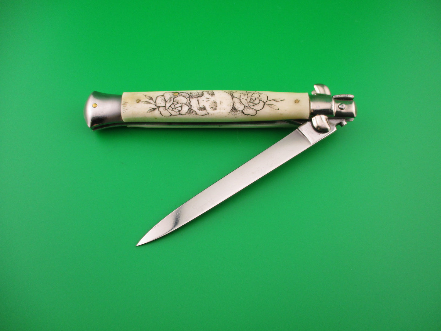 J INOX 28cm Italian Stiletto swivel bolster Scrimshaw Skull & Roses OSK switchblade