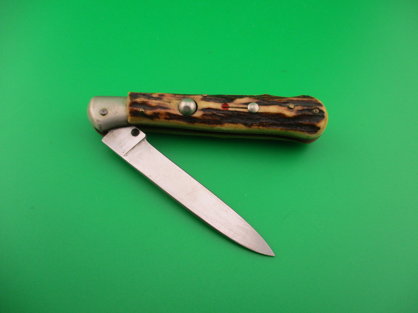 Rostfrei IMPORT 18cm Italian Birds head stag lockback automatic knife red dot