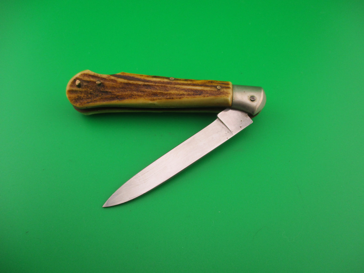 Rostfrei IMPORT 18cm Italian Birds head stag lockback automatic knife red dot