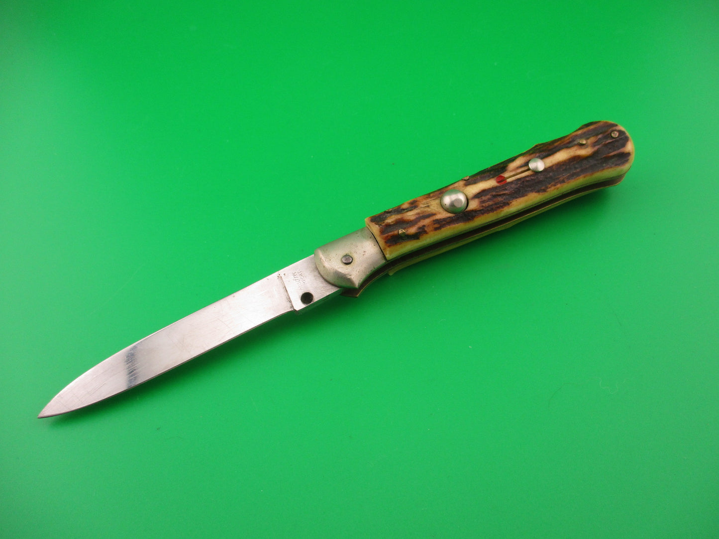 Rostfrei IMPORT 18cm Italian Birds head stag lockback automatic knife red dot