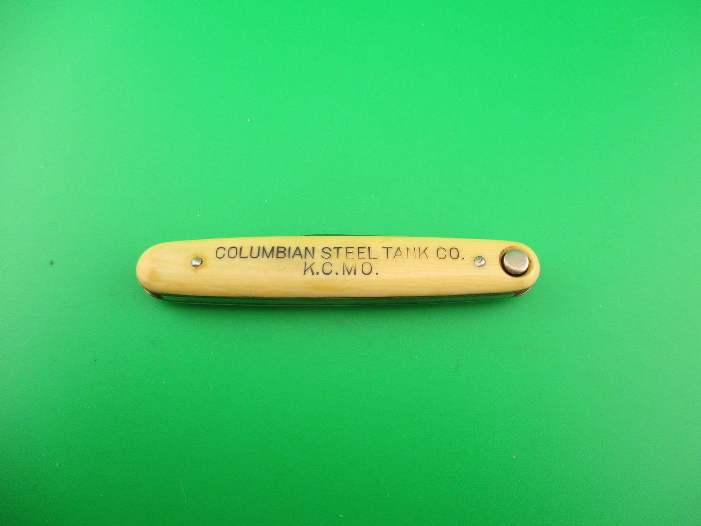 Press Button Knife Co Medium double Ivory cell Columbian Steel Tanks switchblade