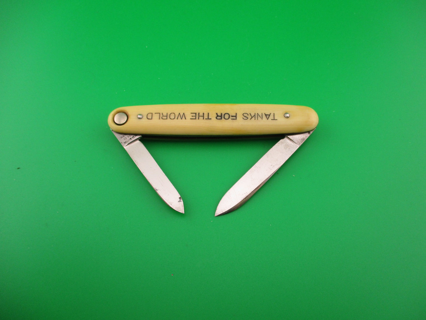 Press Button Knife Co Medium double Ivory cell Columbian Steel Tanks switchblade