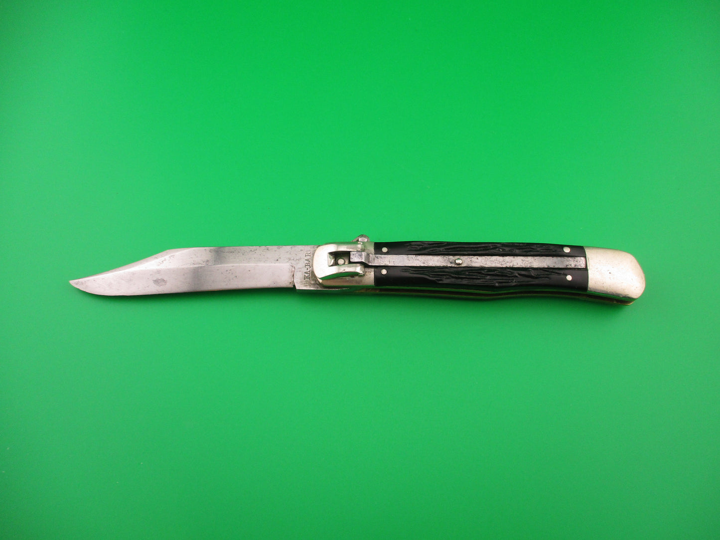 KABAR Lever Black Jigged synthetic Transitional Square lever vintage automatic knife