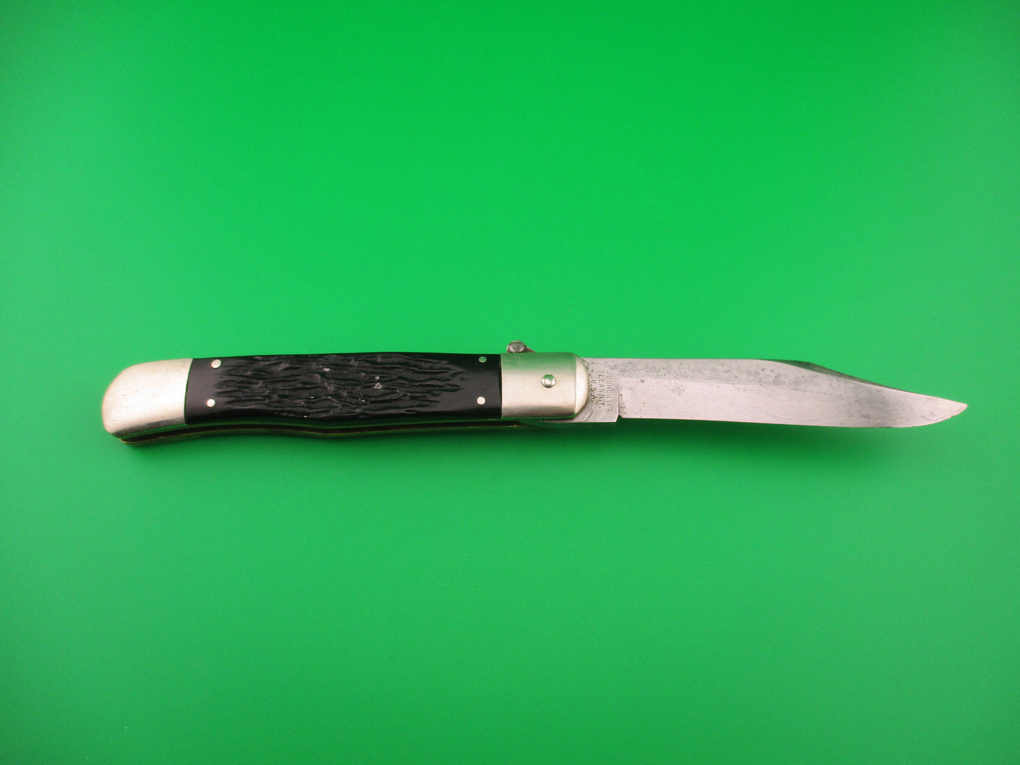 KABAR Lever Black Jigged synthetic Transitional Square lever vintage automatic knife