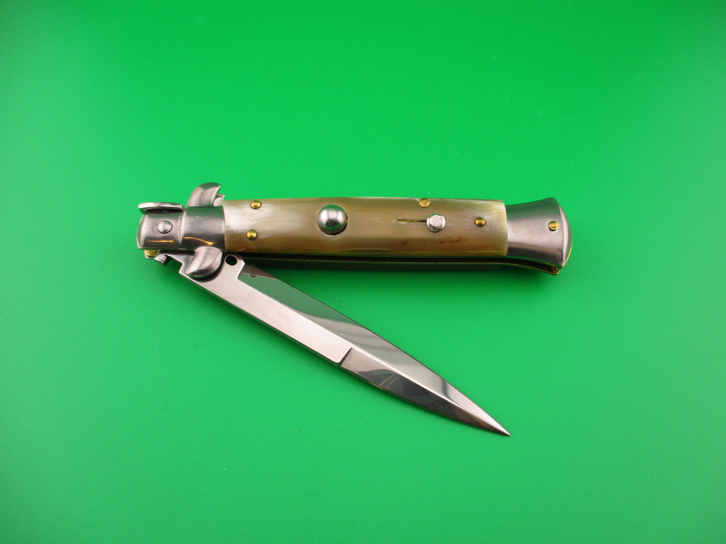 FRANK B 23cm Italian Stiletto Light Honey & Cream horn swivel bolster automatic knife