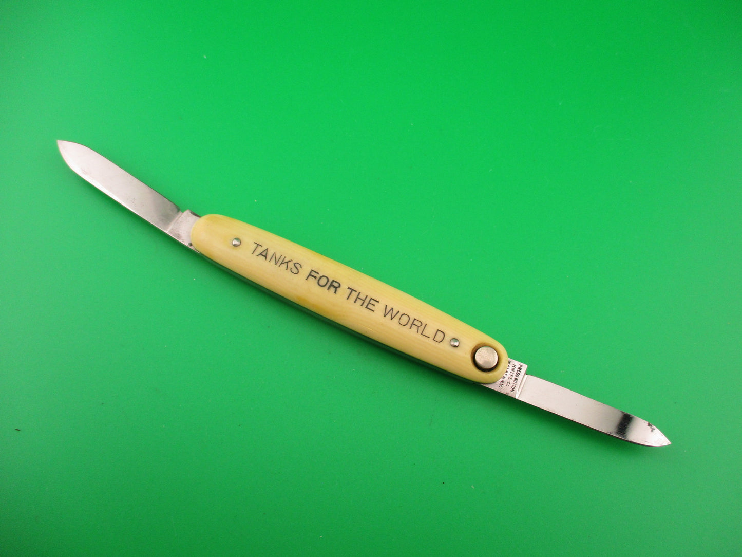 Press Button Knife Co Medium double Ivory cell Columbian Steel Tanks switchblade