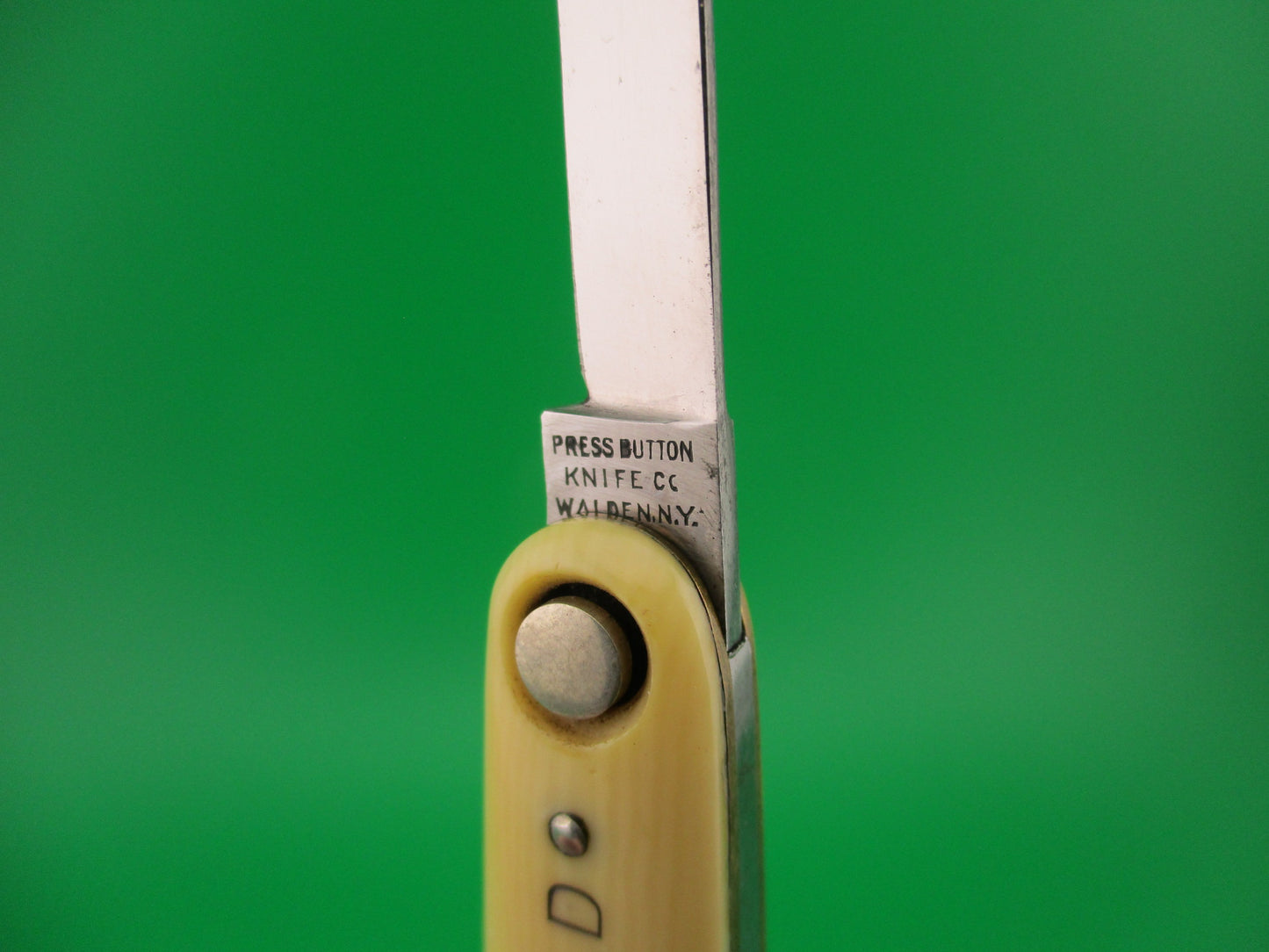 Press Button Knife Co Medium double Ivory cell Columbian Steel Tanks switchblade