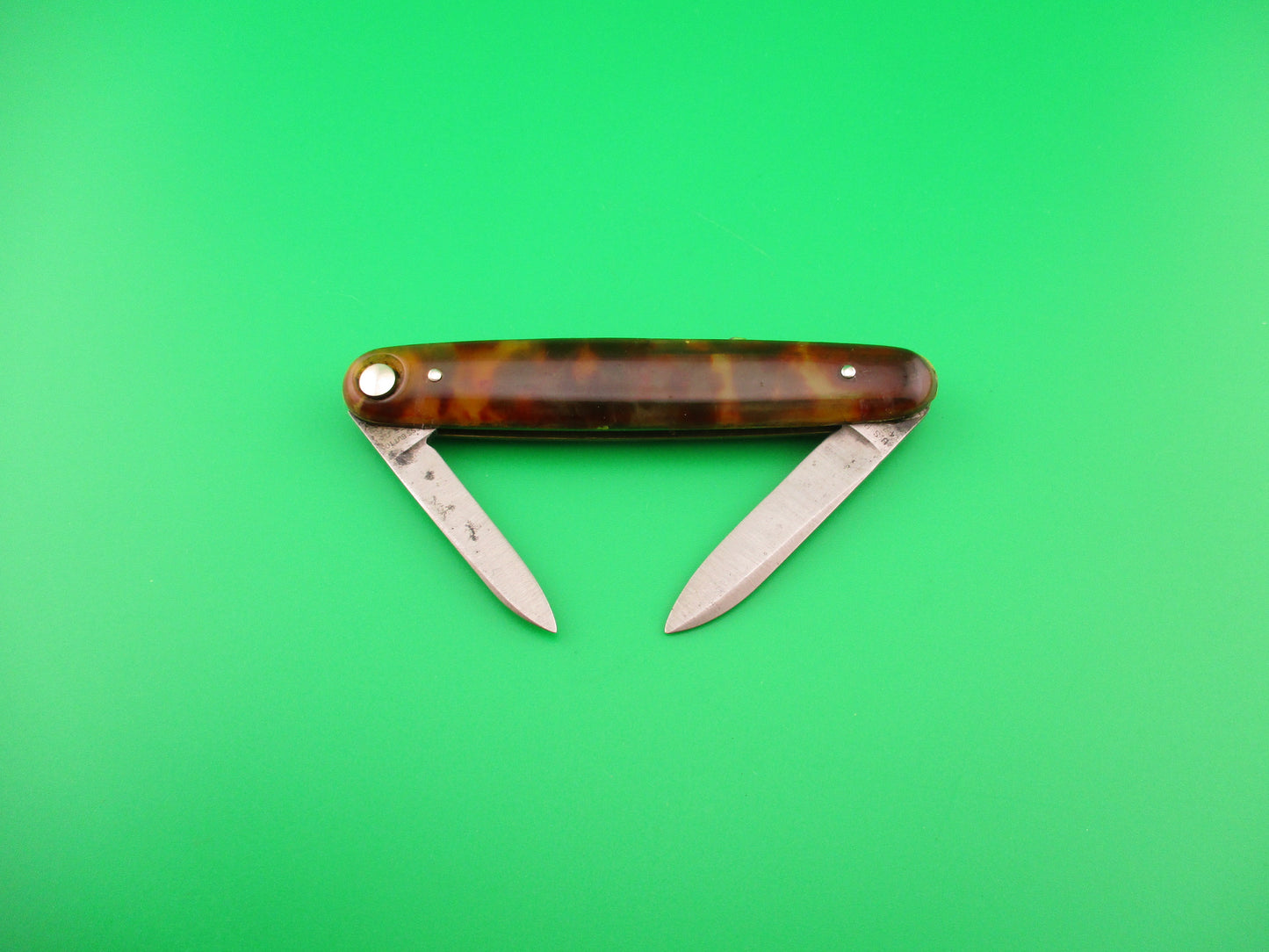 Press Button Knife Co #102 medium double Tortoise celluloid automatic knife