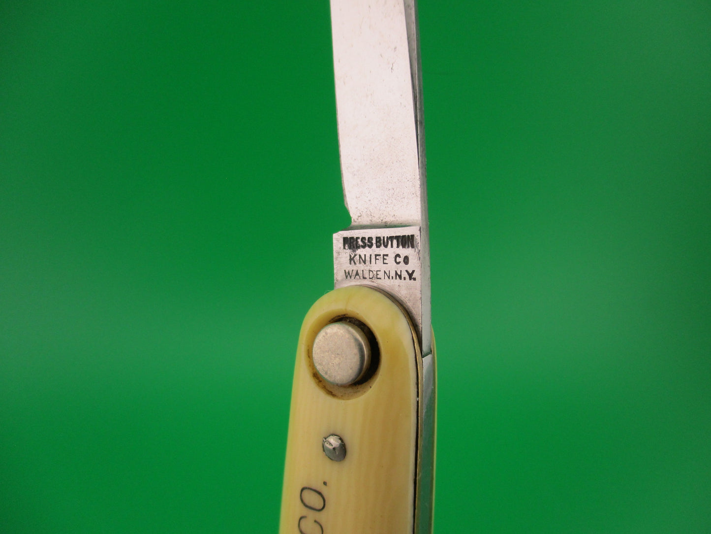 Press Button Knife Co Medium double Ivory cell Columbian Steel Tanks switchblade