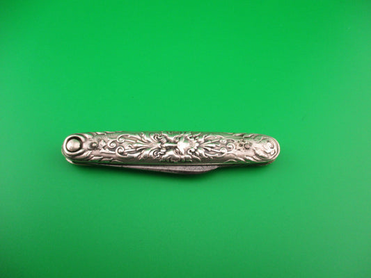 Press Button Knife Co 3 3/8" Sterling SATYR Old Man Winter antique double switchblade
