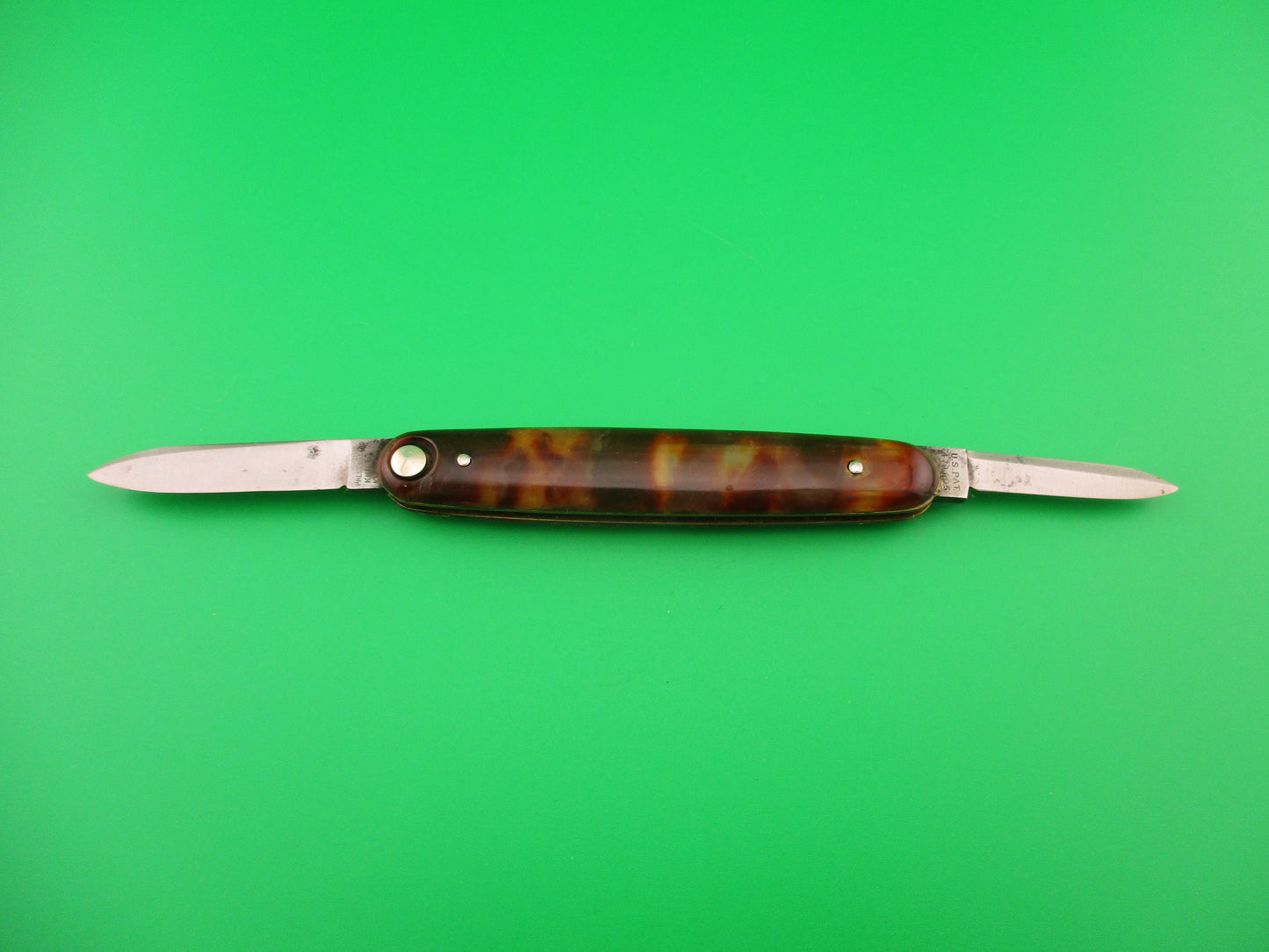 Press Button Knife Co #102 medium double Tortoise celluloid automatic knife