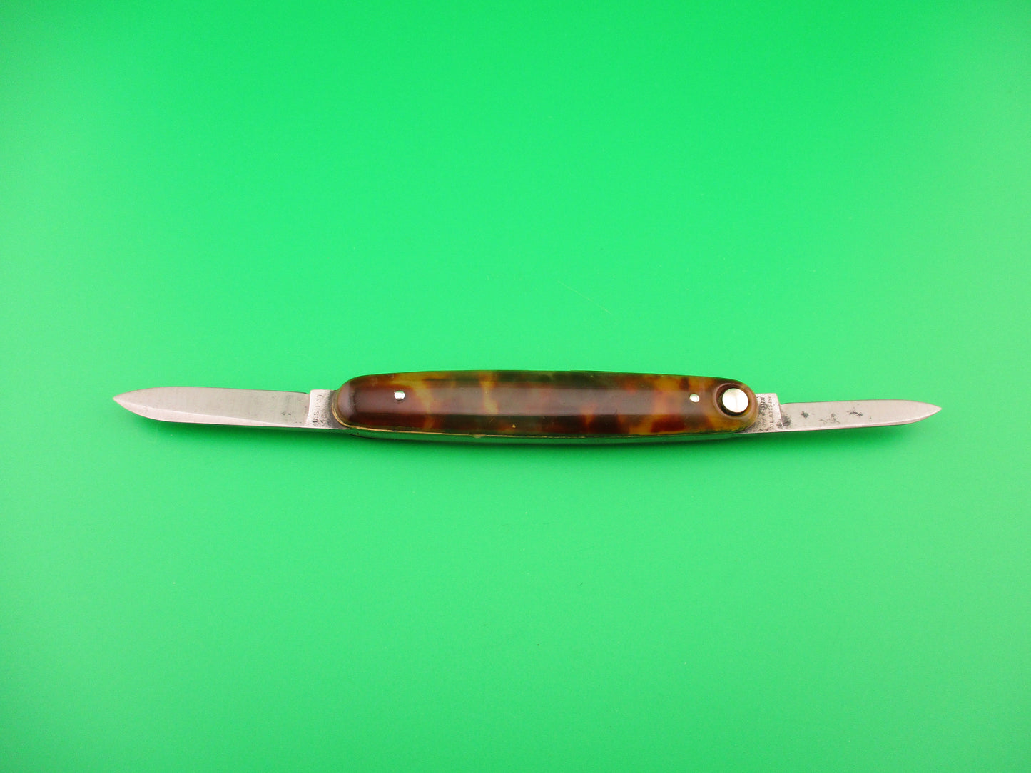 Press Button Knife Co #102 medium double Tortoise celluloid automatic knife
