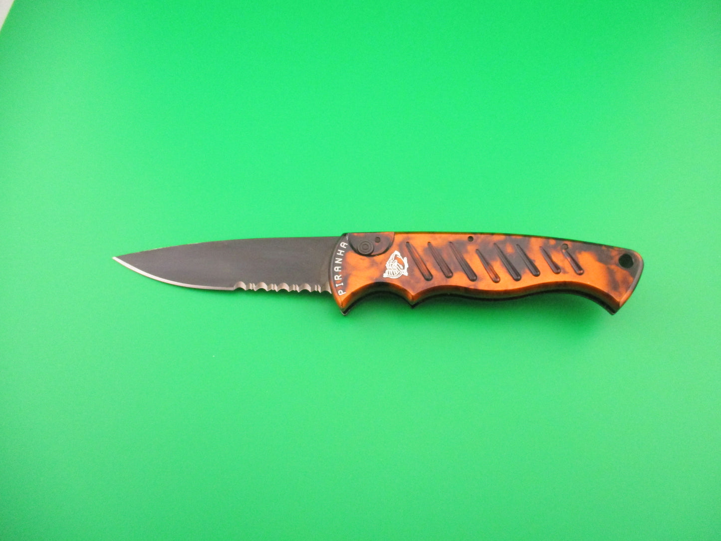 PIRANHA Pocket Copper (red) Marble black partially serrated blade automatic knife