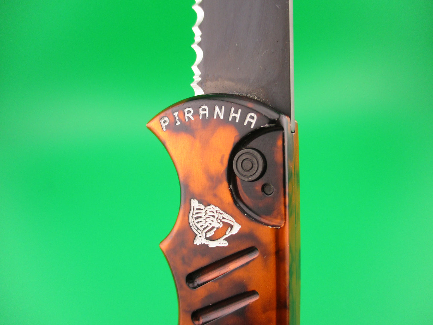 PIRANHA Pocket Copper (red) Marble black partially serrated blade automatic knife