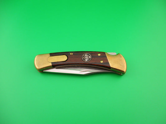BUCK USA 110 Converted SA Wood Brass 100th Anniversary lockback automatic knife