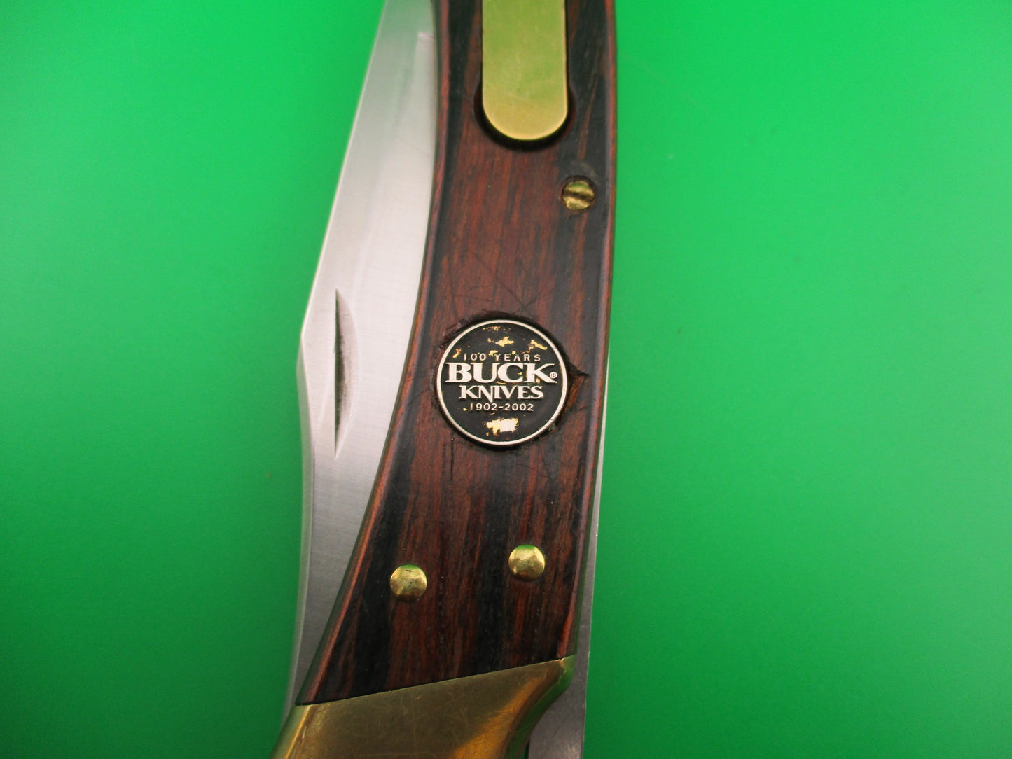 BUCK USA 110 Converted SA Wood Brass 100th Anniversary lockback automatic knife