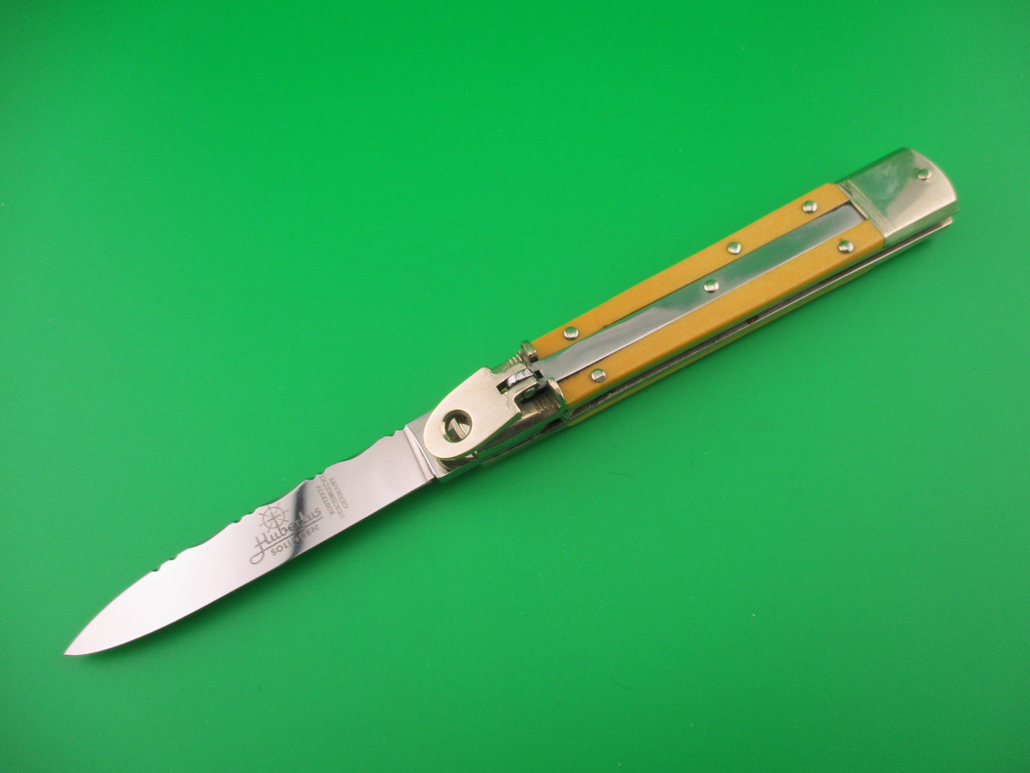 Hubertus 11cm German Lever Slim Line Yellow Micarta vintage automatic knife