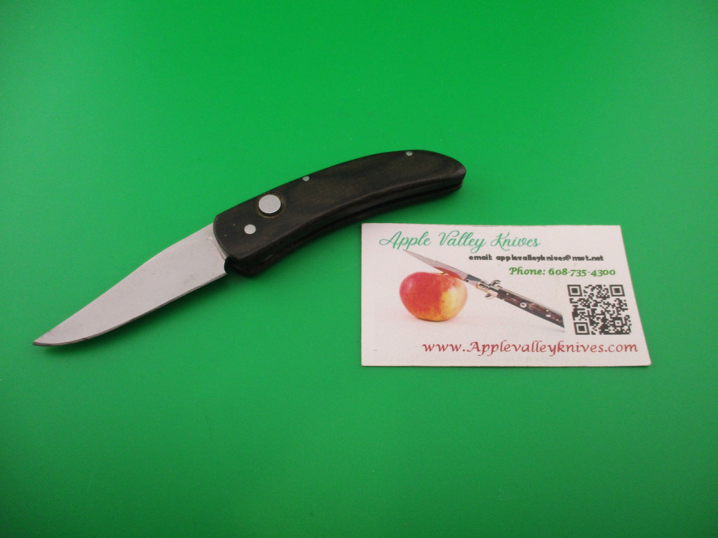 Huck 5.5 inch Custom Coil Spring Curved Micarta automatic knife James Huckeba