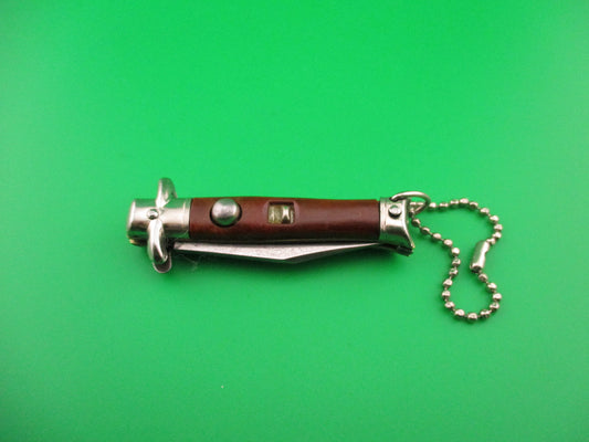 Colonial Snappy Vintage 4th Gen 1950s Rootbeer bowtie keychain switchblade knife